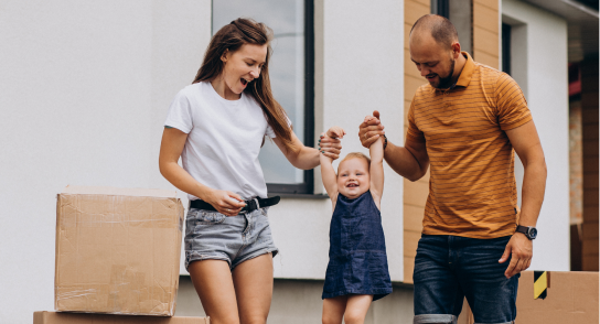 young-family-with-little-daughter-moving-into-new-house 1
